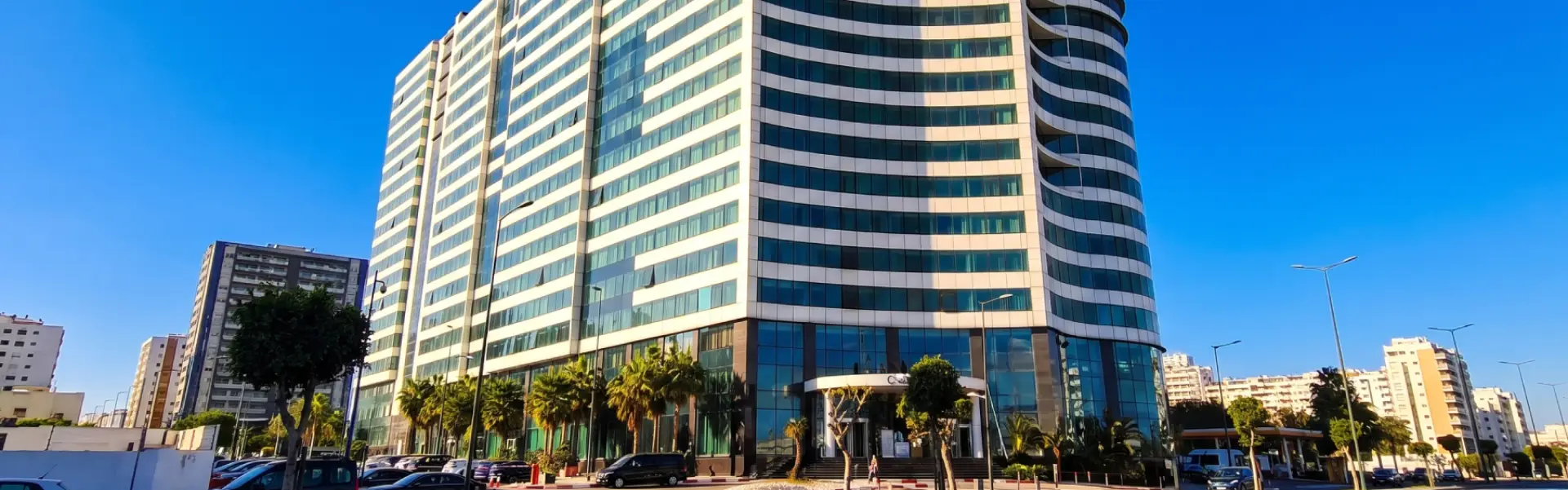 Tall glass highrise tower in Casablanca, a landmark opportunity for commercial real estate in Morocco
