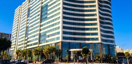Tall glass highrise tower in Casablanca, a landmark opportunity for commercial real estate in Morocco