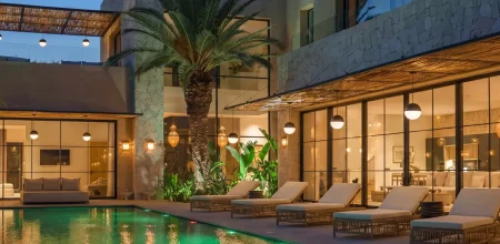 Luxury Marrakech villa with pool, palm trees and lit terrace reflecting Marrakech Property Prices 2026 trends