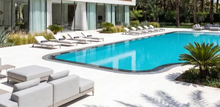Contemporary villa with swimming pool, representing projects from high-end real estate developers in Morocco.